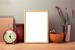 Wooden photo frame on the table