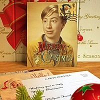 Efeito de foto - Vintage Christmas postcard on the table