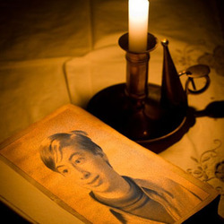 Photo effect - Reading old book by candlelight