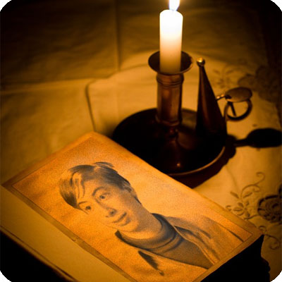 Photo effect - Reading old book by candlelight
