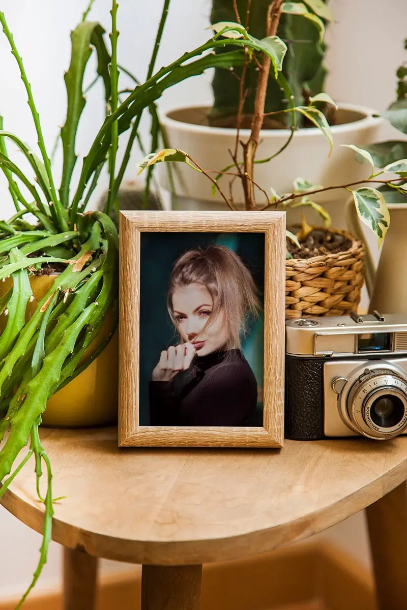 Фотоефект - Wooden photo frame on the wooden table
