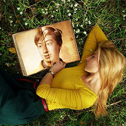 Photo effect - Girl is lying on the grass